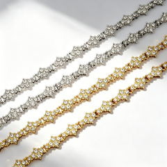Cross-shaped diamond-encrusted tennis bracelet