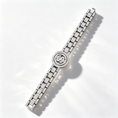 Rotating dollar-shaped diamond-encrusted bracelet