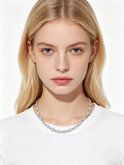 Cross-shaped diamond-encrusted necklace