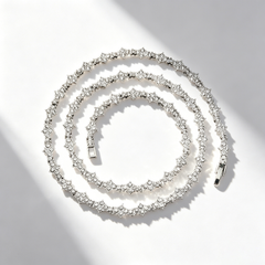 Cross-shaped diamond-encrusted necklace
