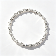 Cross-shaped diamond-encrusted tennis bracelet